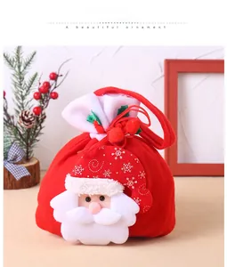 Detail of Christmas gift bag with 3D Santa Claus applique and plush drawstring closure