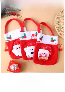 Three-piece Christmas gift bags with Santa, polar bear, and snowman 3D plush character details