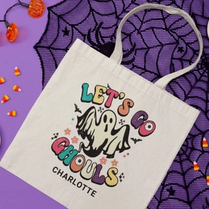 Halloween canvas tote bag with retro ghost print and purple festive accessories