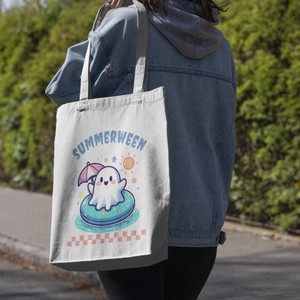 Detail of Summerween ghost print on a white canvas tote bag with shoulder straps