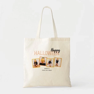 Close-up of Halloween canvas tote bag with custom trick or treat graphics and photo prints