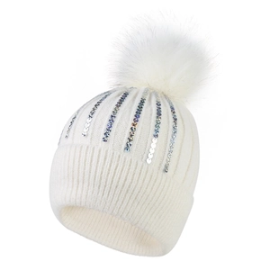 Bonnet en tricot blanc à paillettes colorées et grand pompon en fourrure pour le ski d'hiver