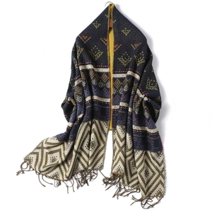 Women's reversible diamond pattern scarf with fringes in navy and yellow ethnic knit style