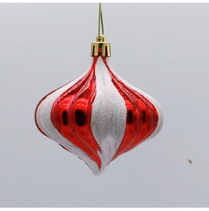 Detail of red and white glitter spiral onion ball ornament with golden hanging string