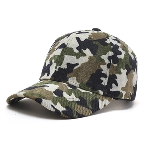 Detail view of a camouflage baseball cap showing knit texture and six-panel stitching