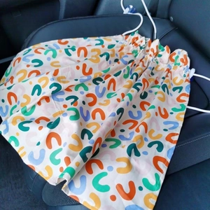 Car side window sunshade with colorful abstract U-shaped patterns and secure suction cups