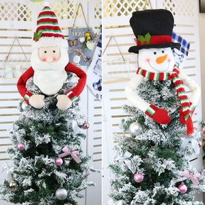 Plush Santa and Snowman Christmas tree topper decorations with striped hats and scarves