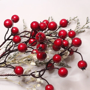Close-up of vibrant red berries with realistic bifurcated branches for Christmas decor