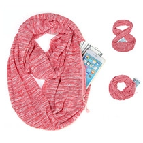 Detail view of red cashmere neck warmer featuring a hidden zipper pocket for phone and cash