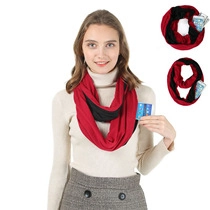 Detail of red and black cashmere-like neck warmer scarf with hidden phone pocket