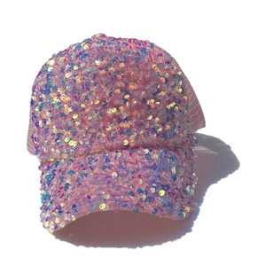 Detailed view of pink sequin baseball cap with laser finish and breathable mesh back