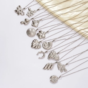 Polished silver stainless steel necklaces with butterfly, heart and floral charms set