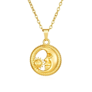 Detail of 18K gold stainless steel necklace with sun and moon coin pendant