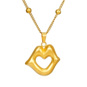 Detail view of 18K gold plated stainless steel necklace with hollow heart lip pendant
