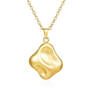 Detailed close-up of 18K gold irregular lava pendant showing glossy metallic texture