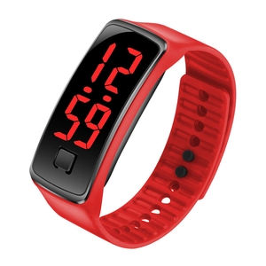 Red LED digital electronic watch with silicone strap and numeric time display on white background