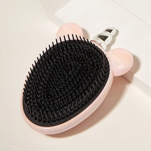 Pink unicorn detangling hairbrush with black bristles and silver horn for scalp massage