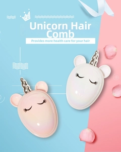 Detail of pink and white unicorn detangling hair brushes with pearlescent finish