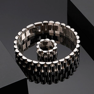 Detail of silver stainless steel jewelry set with punk style watchband link chain