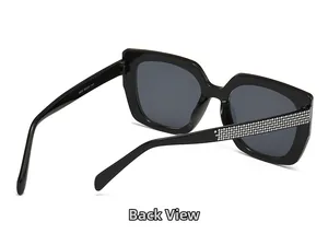 Back view of square cat-eye sunglasses featuring luxury silver rhinestones on thick black frames