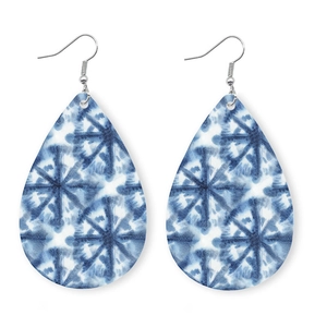 Ethnic teardrop earrings with blue and white porcelain pattern on white background