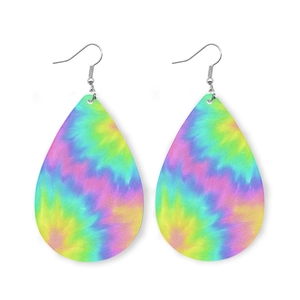 Macro detail of teardrop earrings featuring a vibrant tie-dye pattern on leather texture