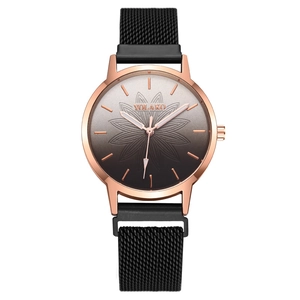 Women's quartz watch with rose gold case, lotus dial, and black magnetic mesh strap