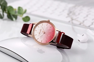 Close-up of elegant women's quartz watch with gradient floral dial and magnetic strap