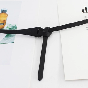 Minimalist black thin PU leather knot belt for dresses with silver metal ring buckle