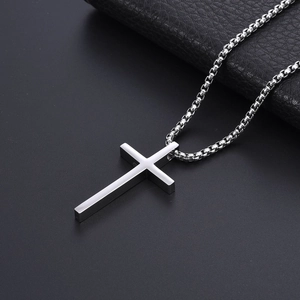 Minimalist polished stainless steel cross pendant on a classic box chain necklace for men