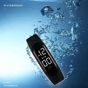 Waterproof digital sports watch with black silicone strap and LED display for outdoor swimming