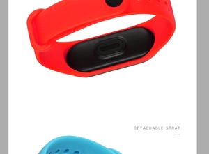Detail showing detachable red and blue silicone sports watch straps with metal buckle