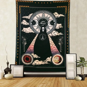 Detail of mystic skeleton tapestry with moon and sun symbols on a neutral wall decor