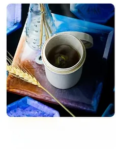 Artistic resin coasters with blue and amber fluid texture made from silicone molds