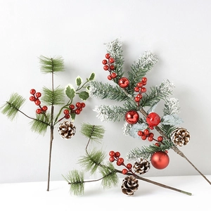 Artificial pine needles with red berries and pine cones for Christmas decor