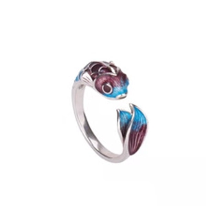 Detailed view of fish-shaped open ring with colorful enamel scales and silver finish