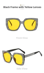 Detail of oversized square sunglasses with black frame, yellow lenses and white rhinestones