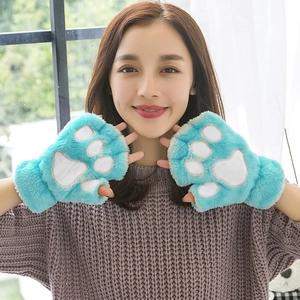 Close-up of sky blue plush cat paw fingerless gloves with soft white padding detail