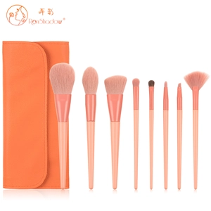 Detail of 8pcs orange makeup brushes set with premium lychee pattern leather storage bag