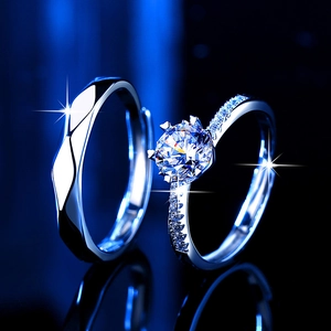 Classic six-prong moissanite couple rings set with geometric faceted silver bands