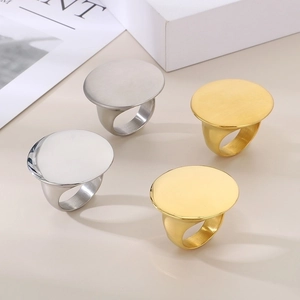 Polished and brushed 18k gold plated stainless steel large round disk rings in set