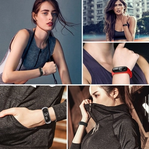 Waterproof digital sports watch for men and women available in black, red, and white