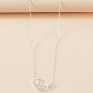 Detail of silver stethoscope heart pendant with heartbeat pulse line on a thin chain