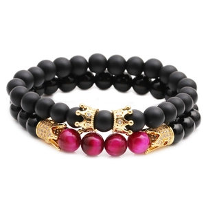 Set di bracciali con perline in onice opaco, occhio di tigre e ciondoli corona