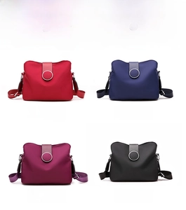 Multi-color waterproof nylon crossbody bags with silver metal rings in four vibrant shades