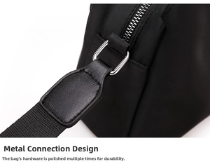 Detail of durable silver metal buckle connecting to the black nylon crossbody bag strap
