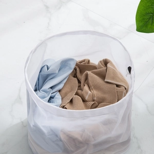 Durable fine mesh laundry bag with drawstring for protecting clothes in washing machine