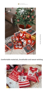 Christmas themed cotton socks set in red gift box with festive cartoon patterns