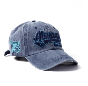 Washed navy blue baseball cap with white embroidery shown from a 45-degree angle view