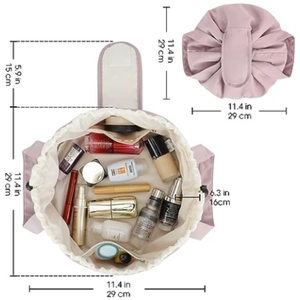 Pink drawstring makeup bag showing open and closed dimensions for travel storage